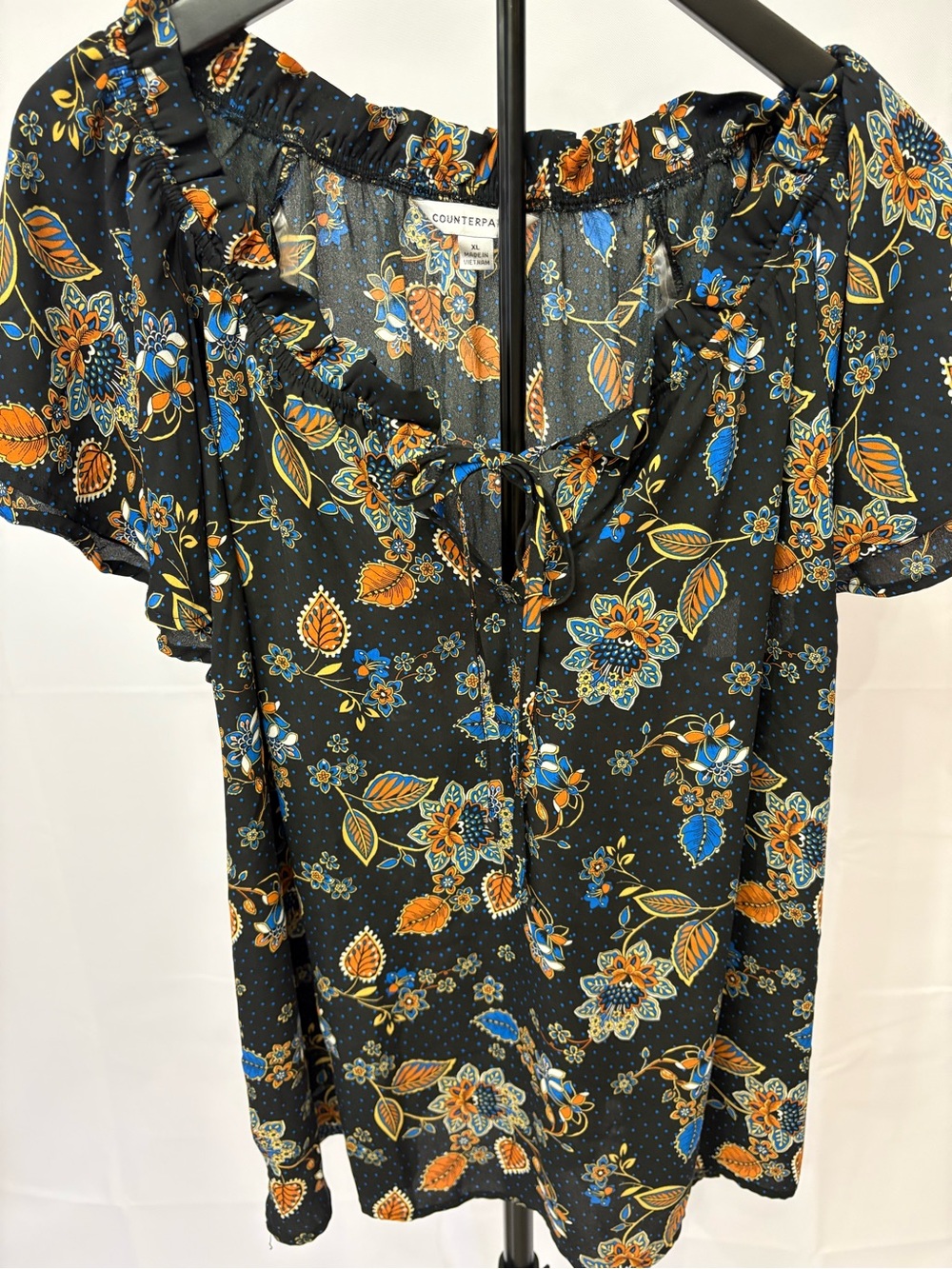 Counterparts Black Floral Tie-Neck Blouse with Blue and Orange Accents